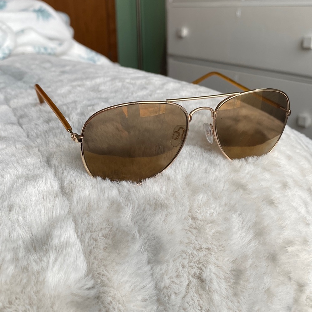 Gold colored sunglasses